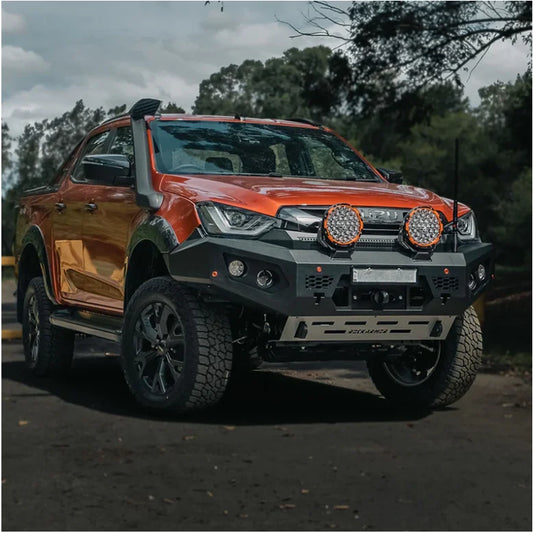 Orange off-road pickup truck with Rockarmor GT Bull steel bull bar and driving lights