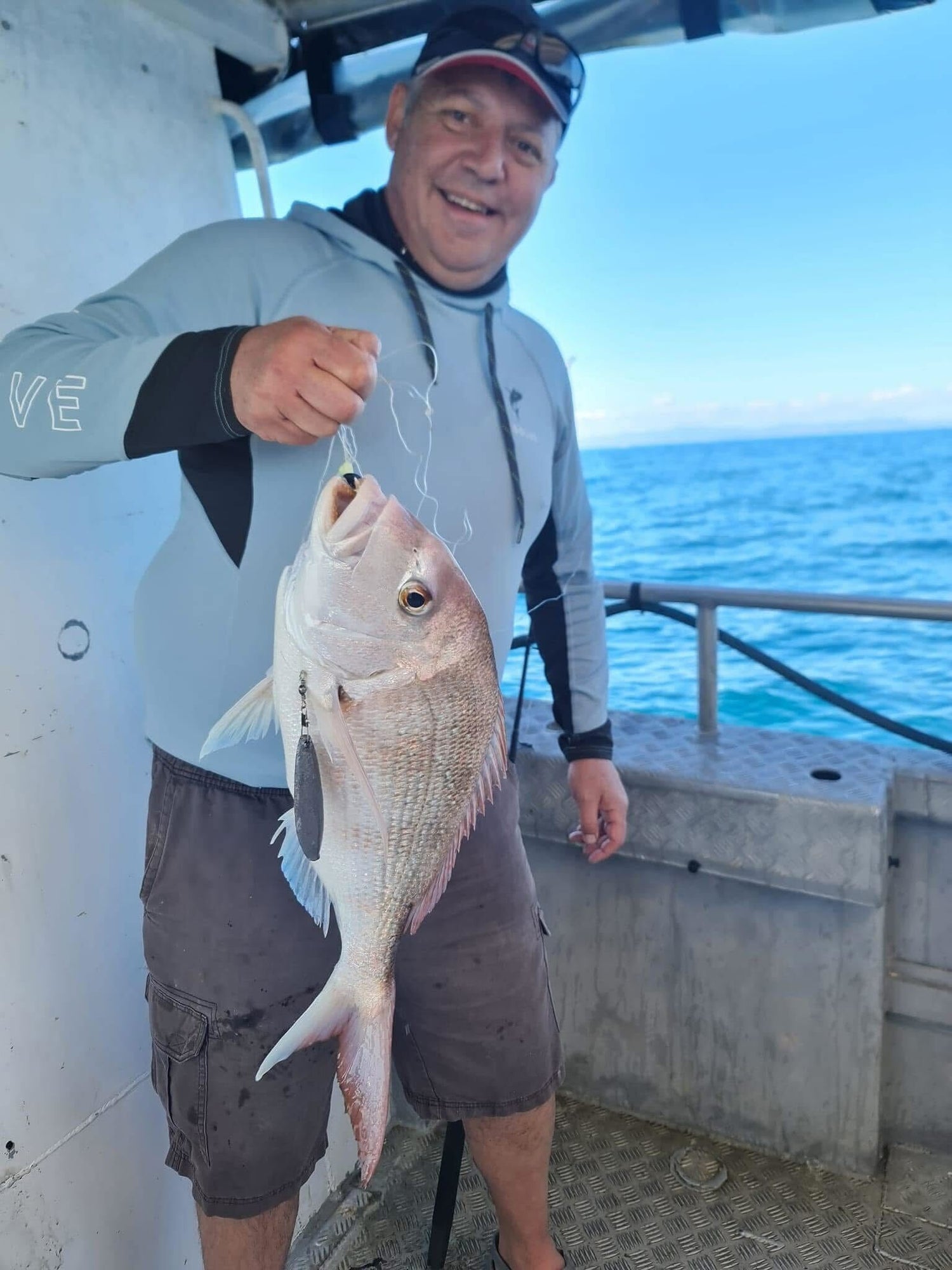 man holding fish