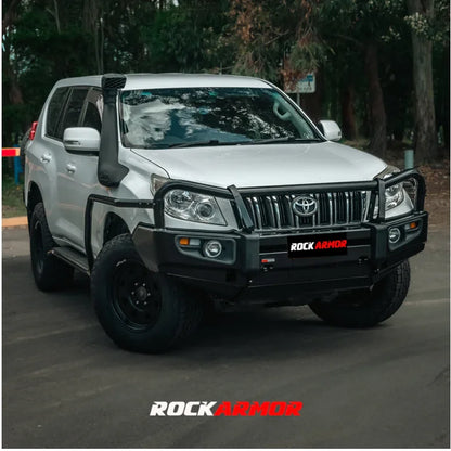 Silver off-road vehicle with black accessories featuring the Rockarmor Elite Steel Bullbar for Toyota Prado 150 2009-2013