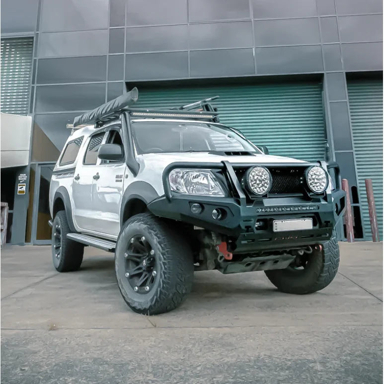 White off-road pickup truck with Hoop Steel Bullbar for maximum frontal protection