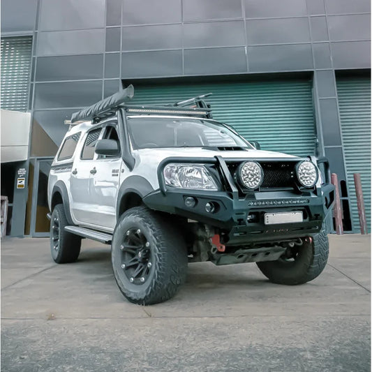 White off-road pickup truck with Hoop Steel Bullbar for maximum frontal protection