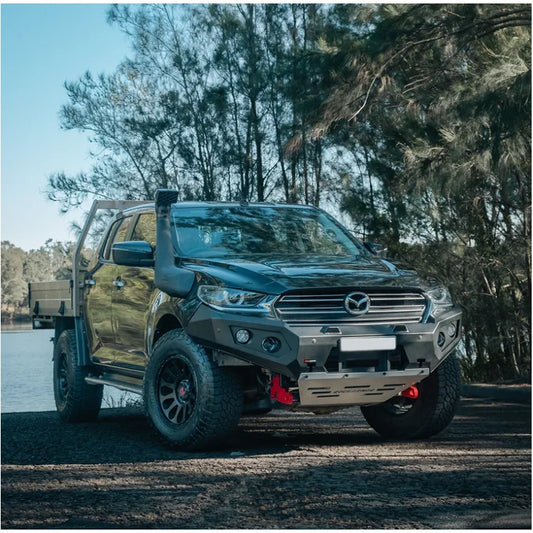 Black Mazda pickup truck with RockArmor GT Steel bull bar and driving lights