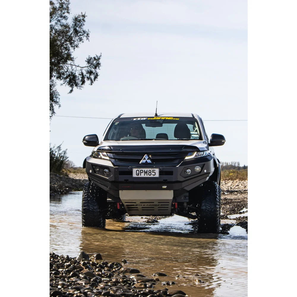 Black Mitsubishi pickup truck with Rockarmor Gt Steel Hoopless Bullbar and driving lights