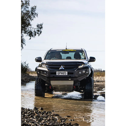 Black Mitsubishi pickup truck with Rockarmor Gt Steel Hoopless Bullbar and driving lights
