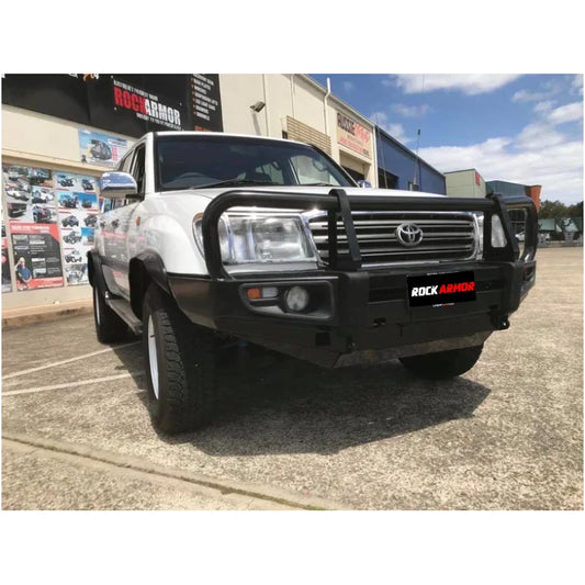 White pickup truck with black bull bar and fog lights, premium steel bullbar for Toyota Landcruiser Fj100