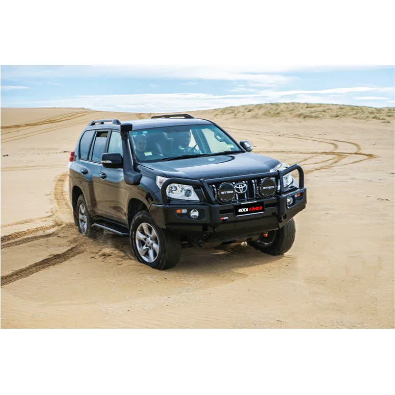 Black off-road Toyota SUV with Rockarmor premium steel bullbar and fog lights