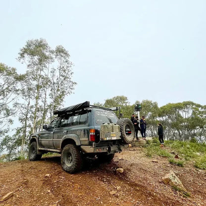 Off-road vehicle with wheel carrier and spare wheel, fitting video available for Nissan Patrol Y61 Gu4